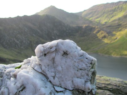 A dog-rock with Snowdon behind