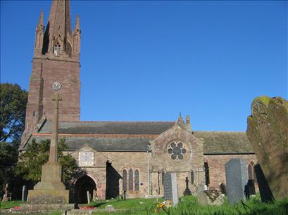 Weobley Church with sundial above the door